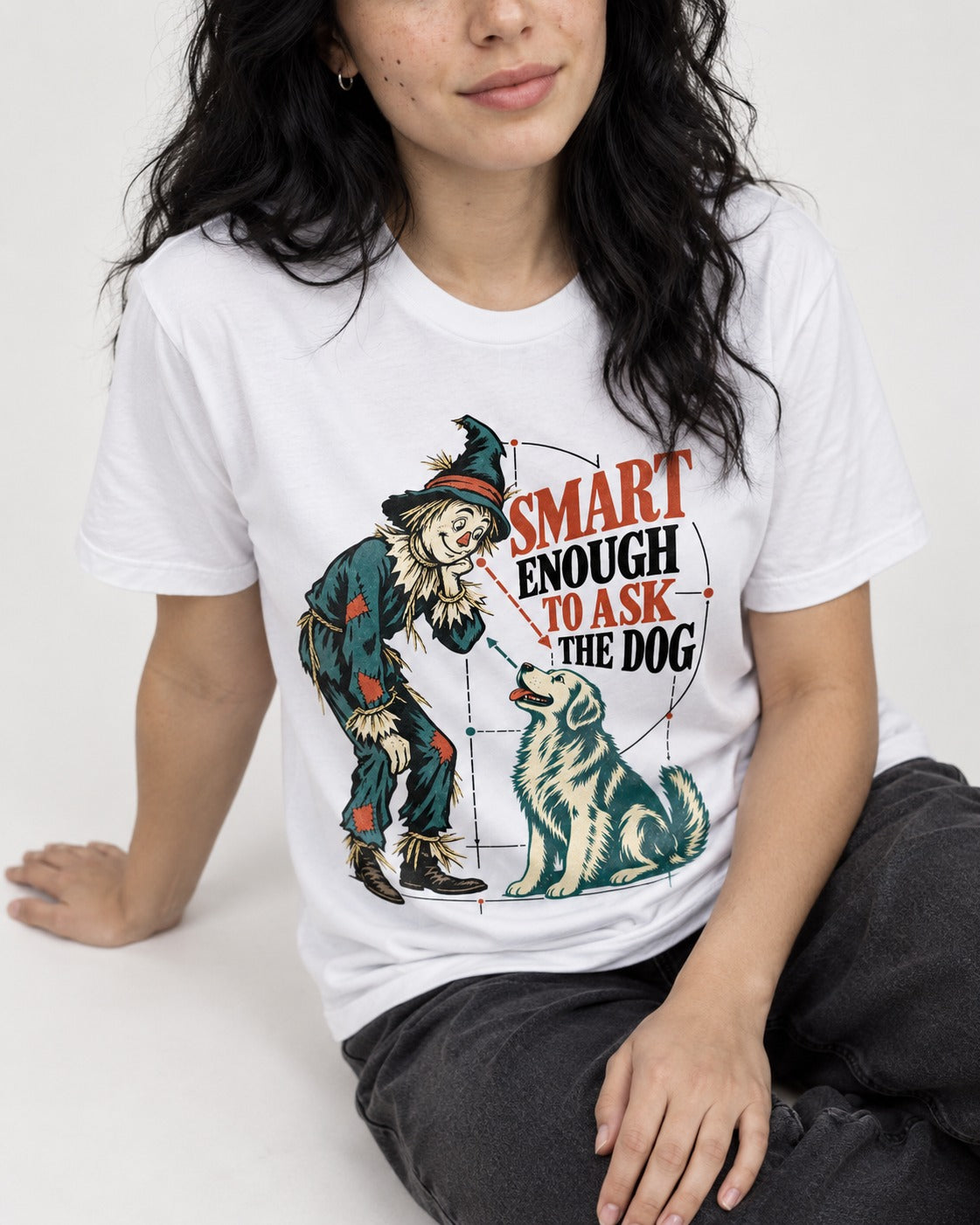 Ask the Golden Retriever T-Shirt in White, worn by a seated model