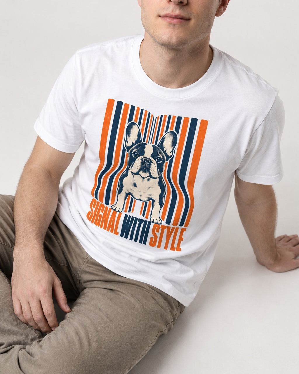 Frenchie Signal T-Shirt in White, worn by a seated model