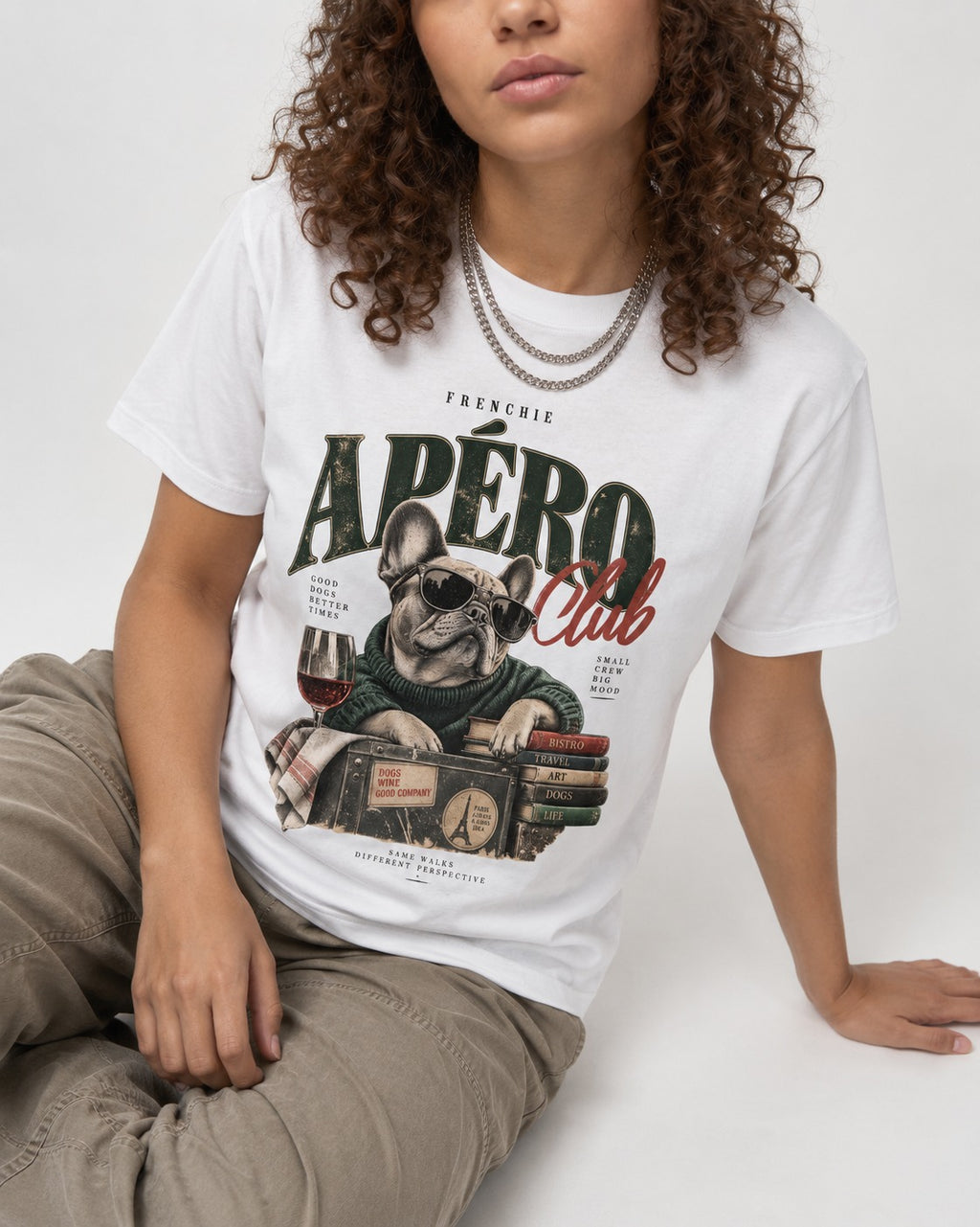 Frenchie Apero Club T-Shirt in White, worn by a seated model