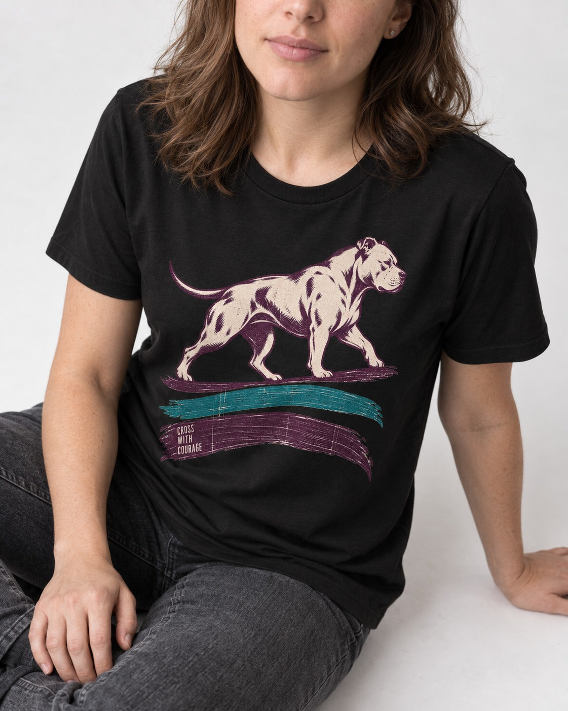 Pitbull Cross with Courage Brushstroke Graphic T-Shirt in Black, worn by a seated model