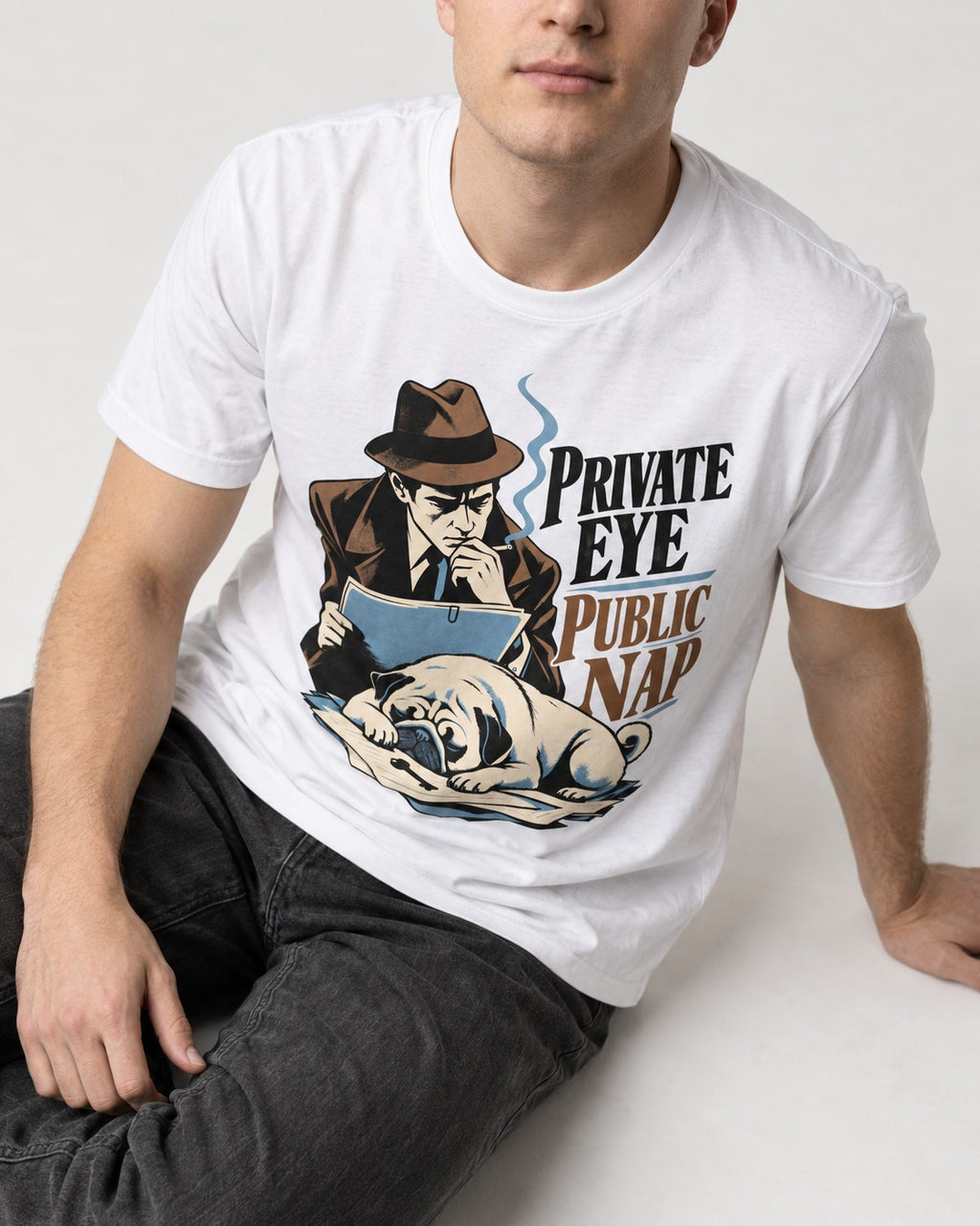 Pug Private Eye Public Nap T-Shirt in White, worn by a seated model