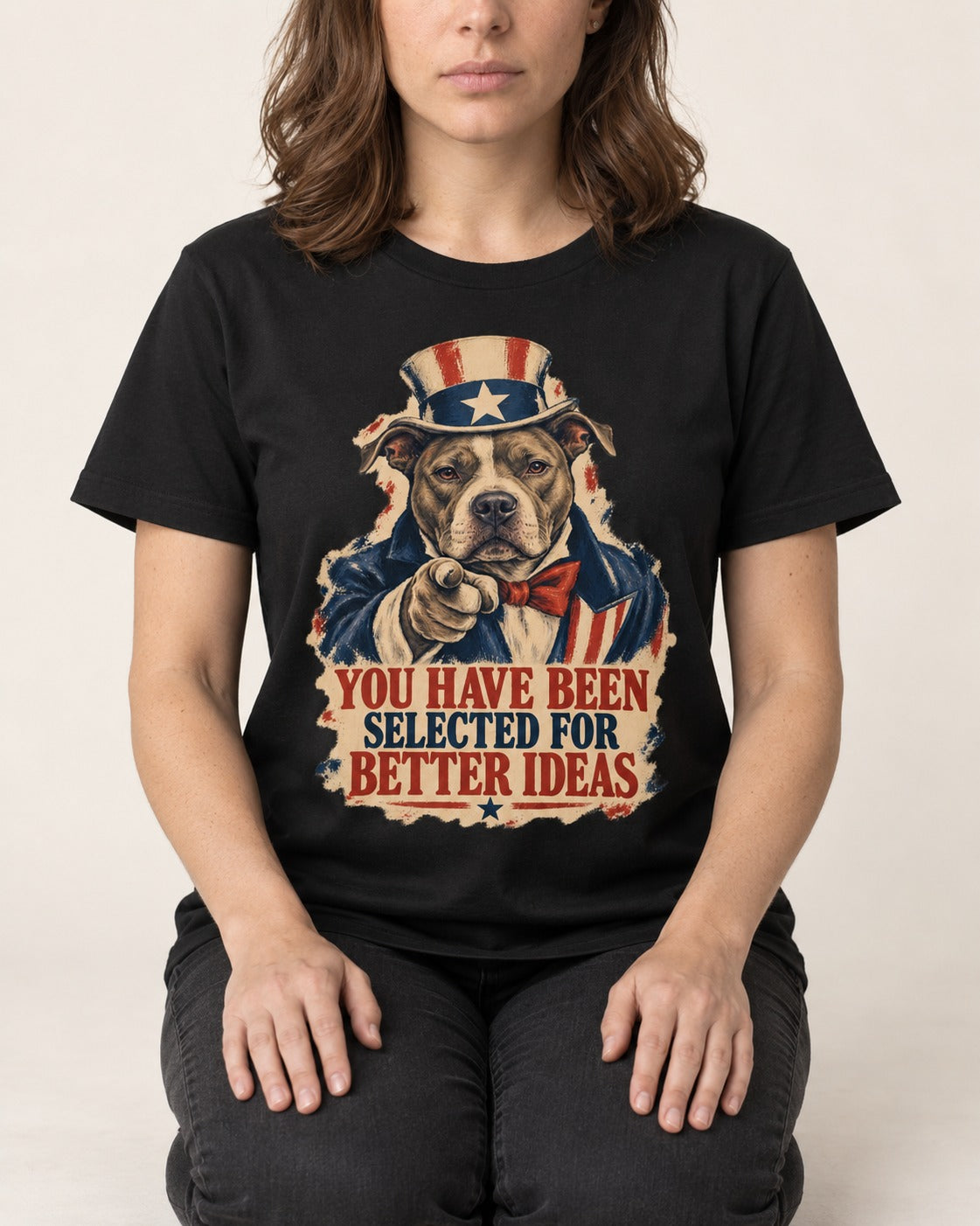 Pitbull You Have Been Selected for Better Ideas Uncle Sam Graphic T-Shirt in Black, worn by a seated model