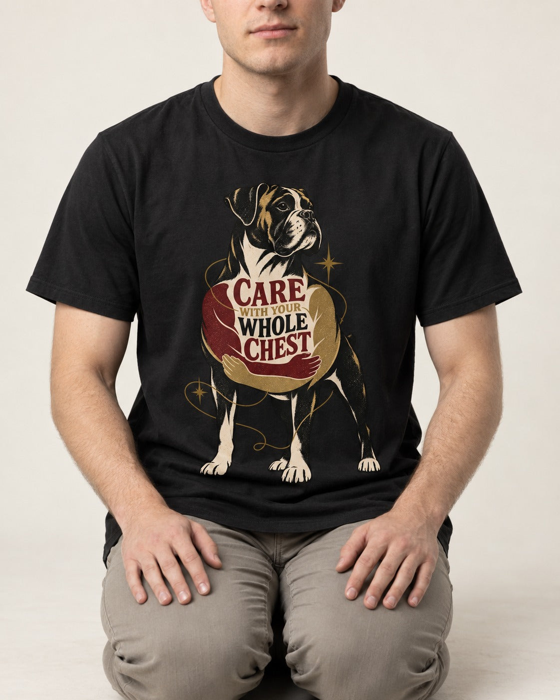 Boxer Care With Your Whole Chest T-Shirt in Black, worn by a seated model
