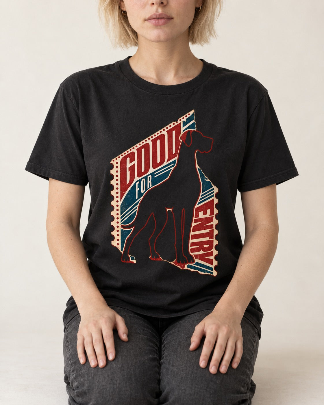 Great Dane Good for Nothing Ticket Cutout Graphic T-Shirt in Black, worn by a seated model
