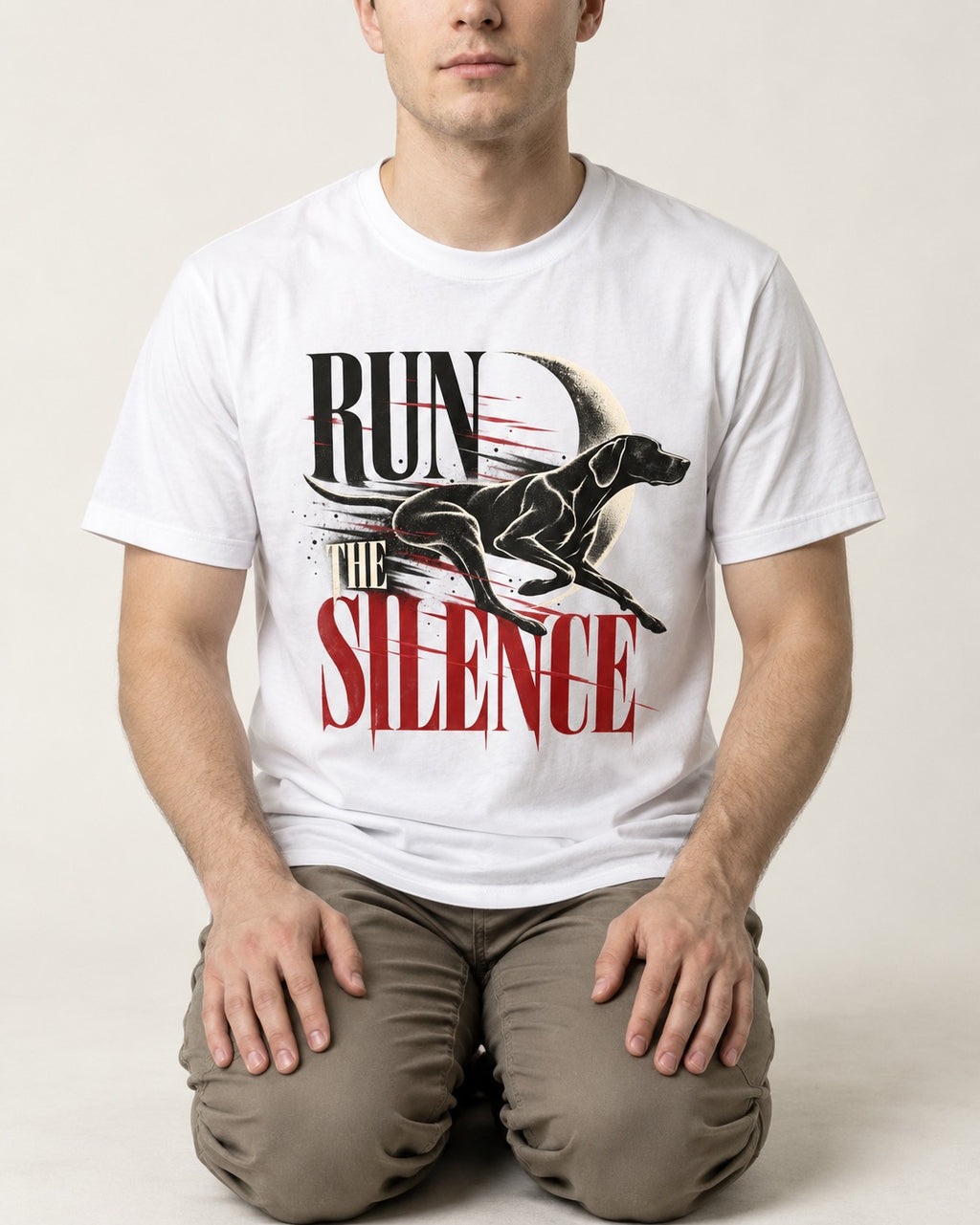 Run the Silence German Shorthaired Pointer T-Shirt in White, worn by a seated model