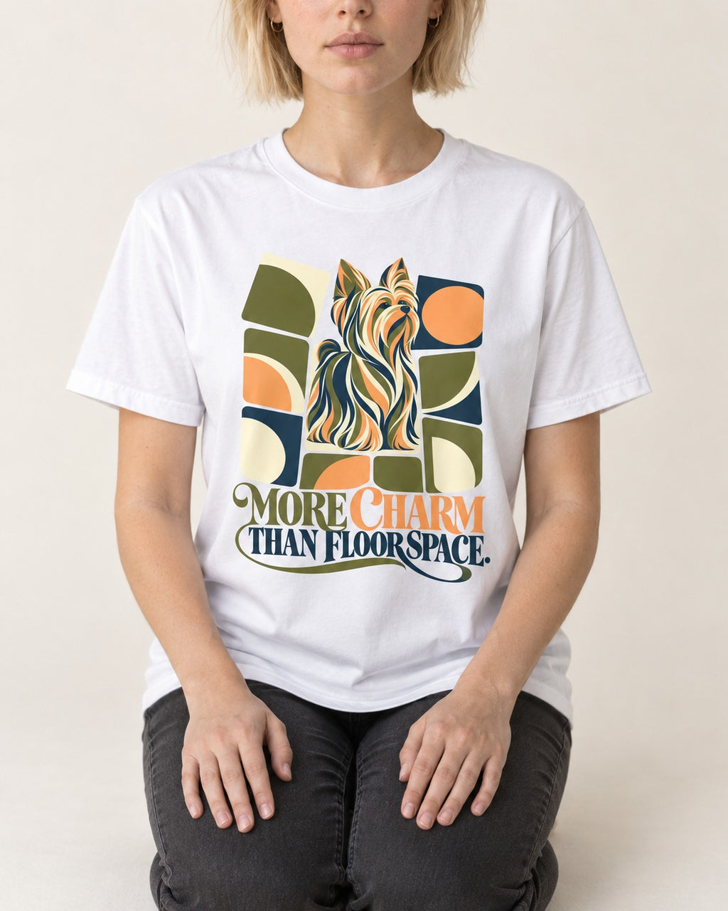 Yorkshire Terrier More Charm Than Space T-Shirt in White, worn by a seated model