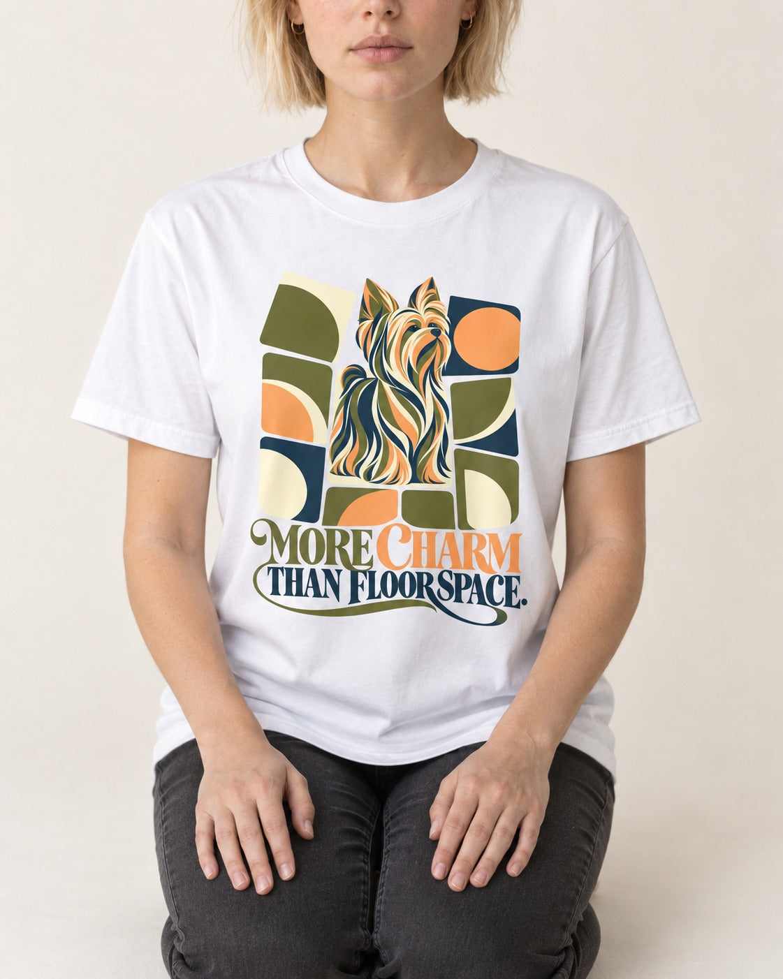 Yorkshire Terrier More Charm Than Space T-Shirt in White, worn by a seated model