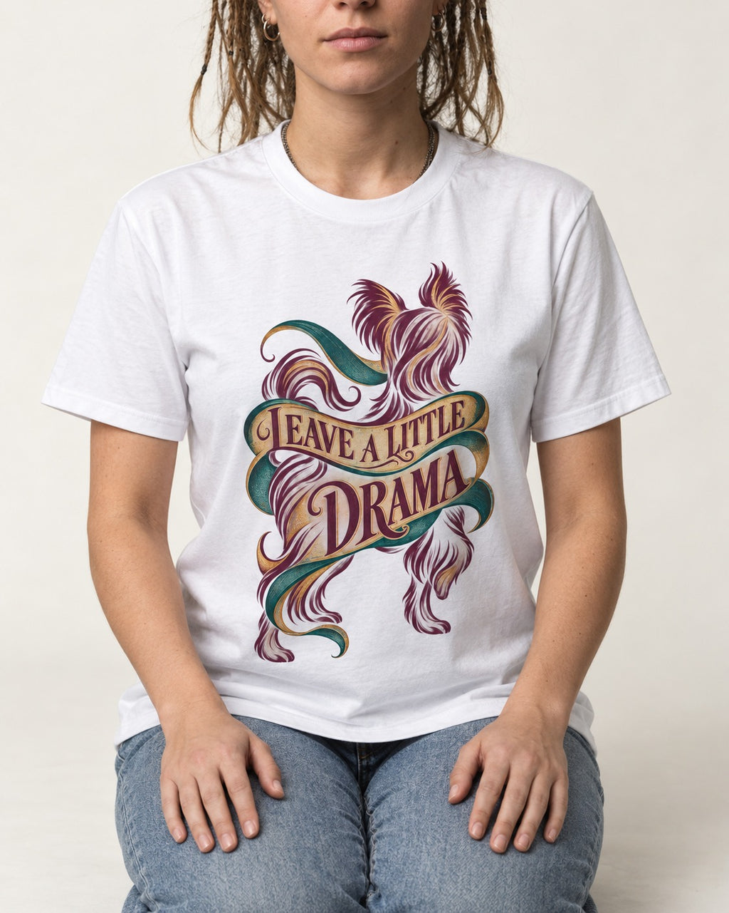 Leave a Little Drama Yorkshire Terrier T-Shirt in White, worn by a seated model