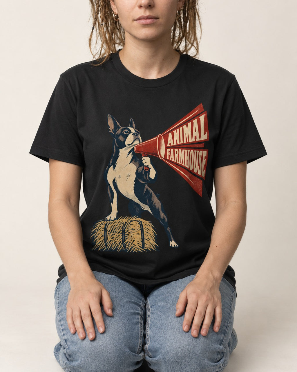 Animal Farmhouse Boston Terrier T-Shirt in Black, worn by a seated model
