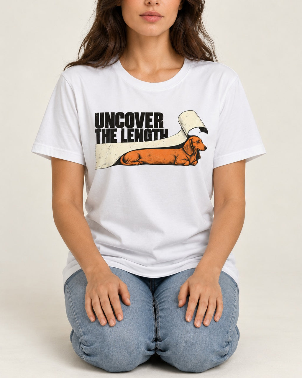 Uncover the Dachshund Length T-Shirt in White, worn by a seated model