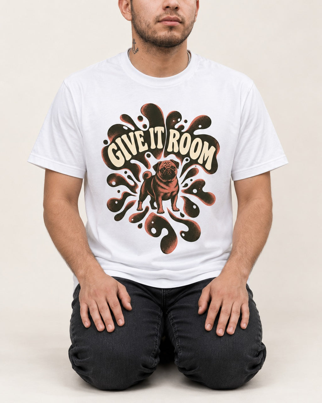 Give Pug Room T-Shirt in White, worn by a seated model
