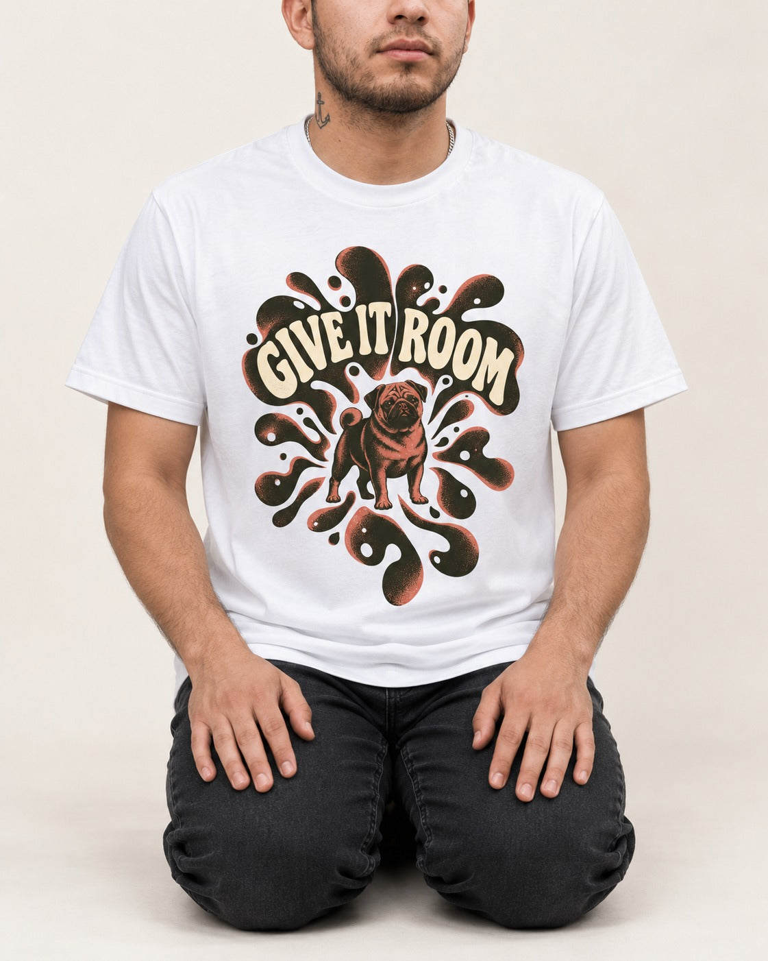 Give Pug Room T-Shirt in White, worn by a seated model