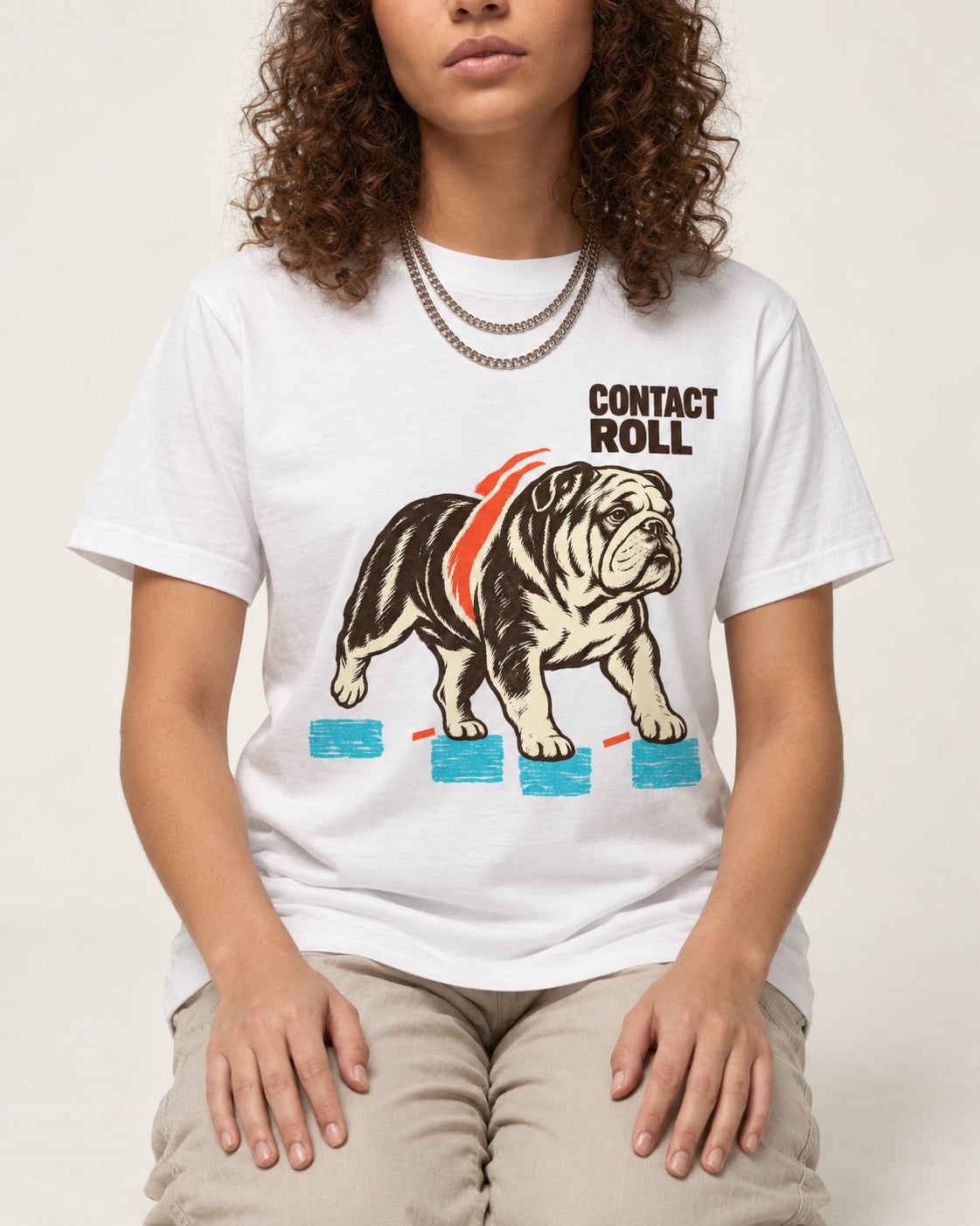 Contact Roll English Bulldog T-Shirt in White, worn by a seated model