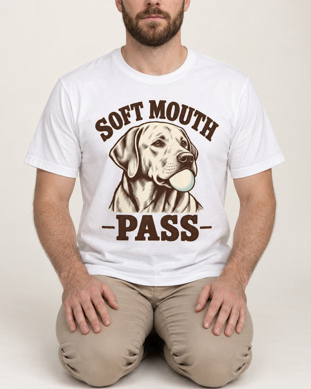 Soft Mouth Pass Labrador Retriever T-Shirt in White, worn by a seated model