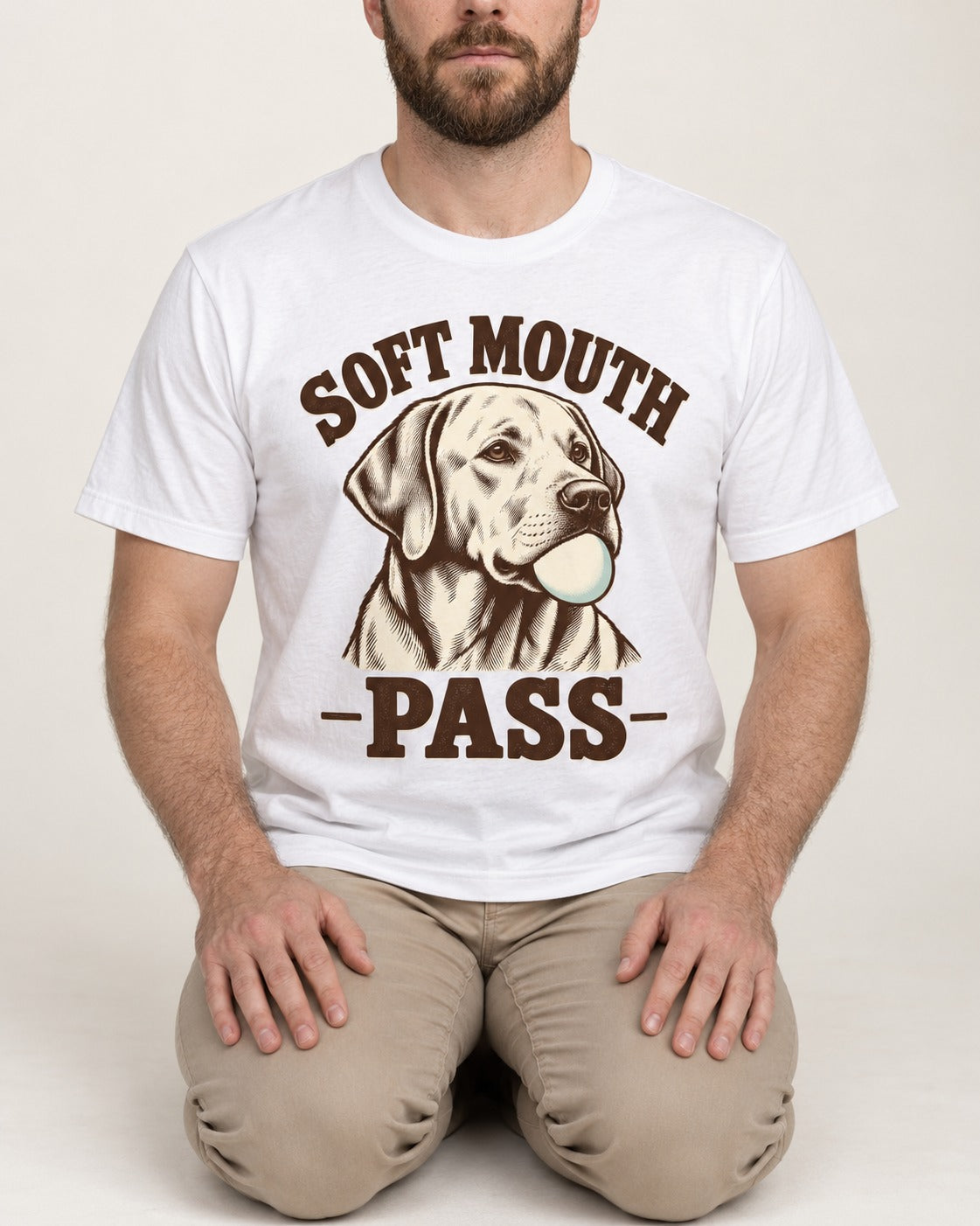Soft Mouth Pass Labrador Retriever T-Shirt in White, worn by a seated model