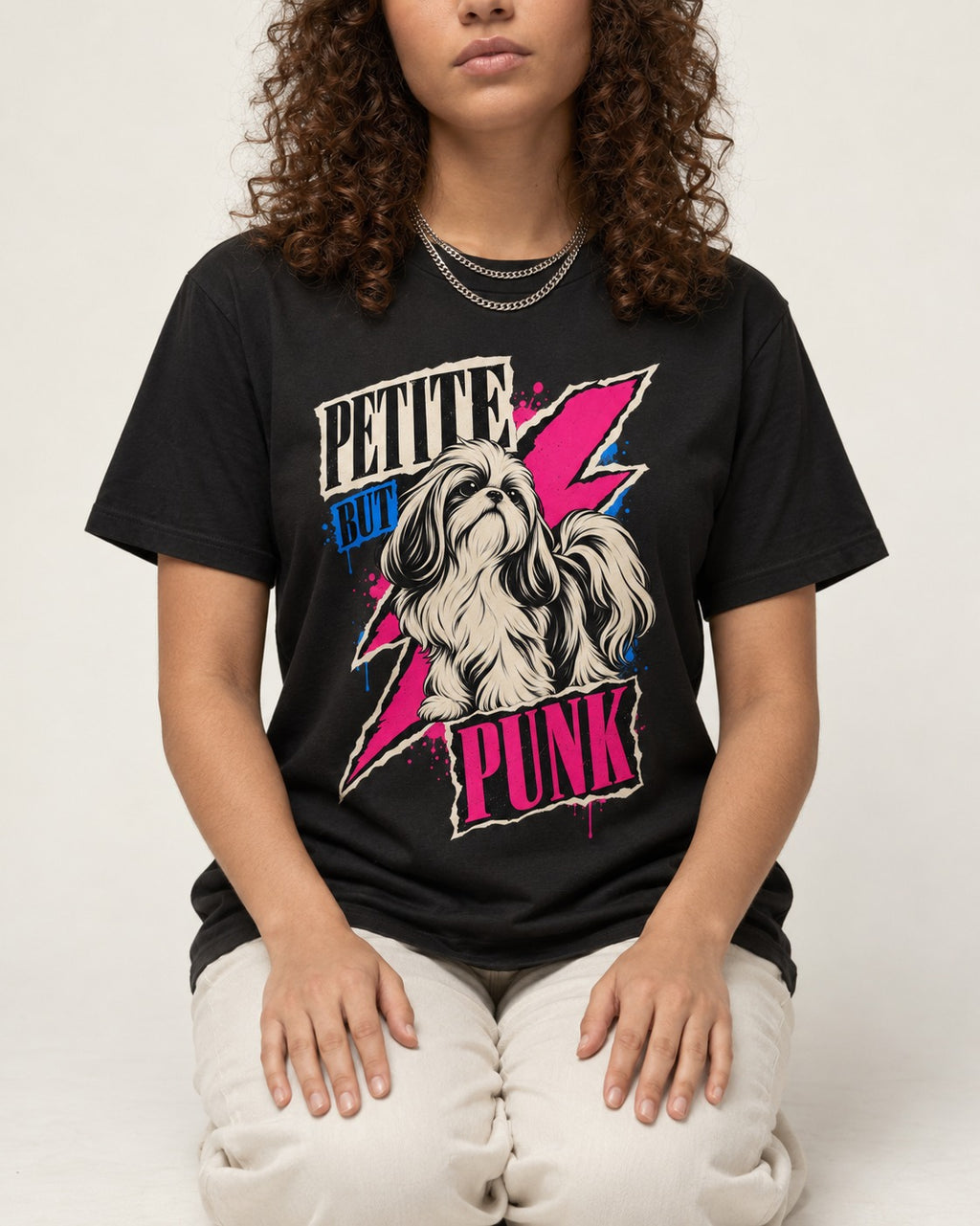 Shih Tzu Petite but Punk Lightning Graphic T-Shirt in Black, worn by a seated model
