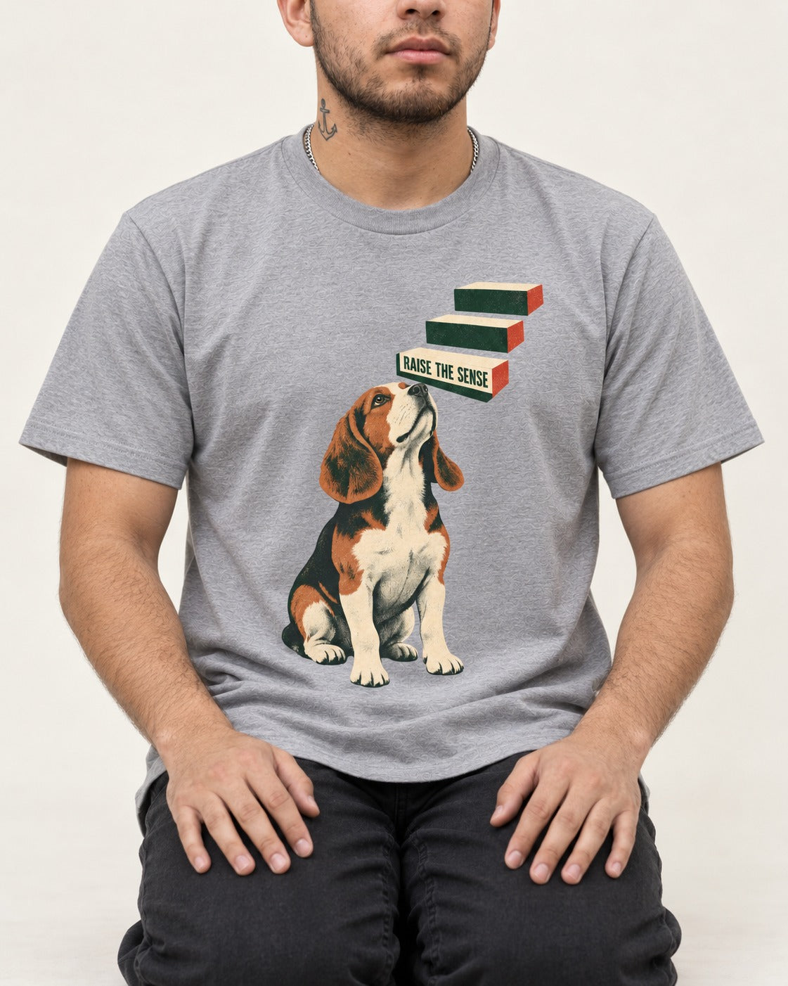 Raise The Sense Beagle Scent Hound T-Shirt in Sport Grey, worn by a seated model