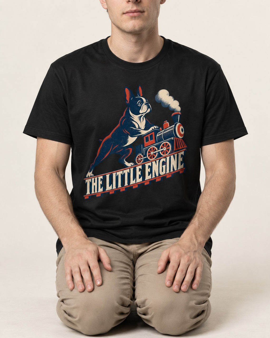 Boston Terrier The Little Engine T-Shirt in Black, worn by a seated model
