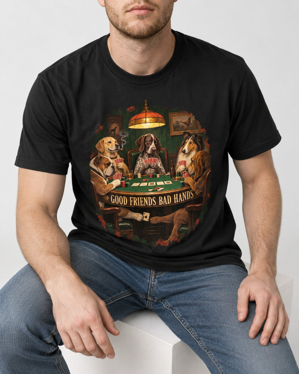German Shorthaired Pointer Good Friends Bad Hands Poker Night Graphic T-Shirt in Black, worn by a seated model