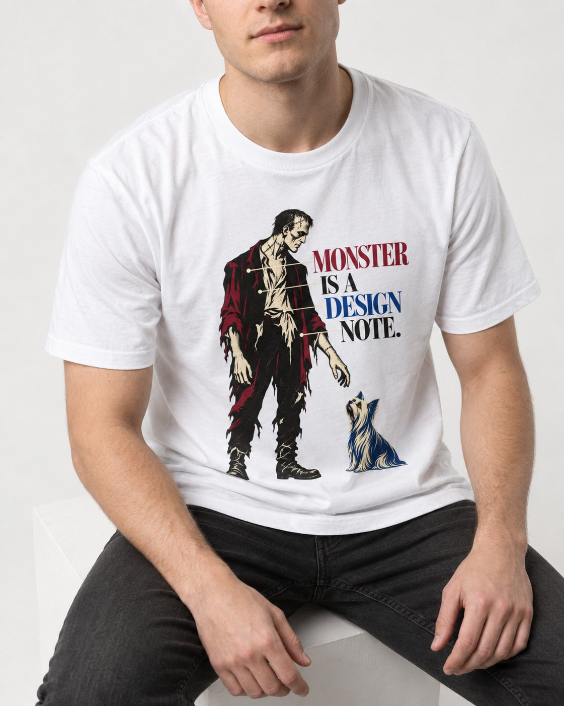 Yorkshire Terrier Monster T-Shirt in White, worn by a seated model