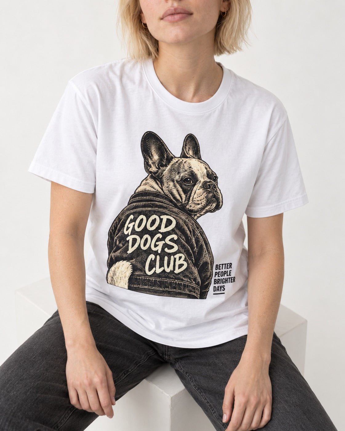 Good Frenchie Club T-Shirt in White, worn by a seated model