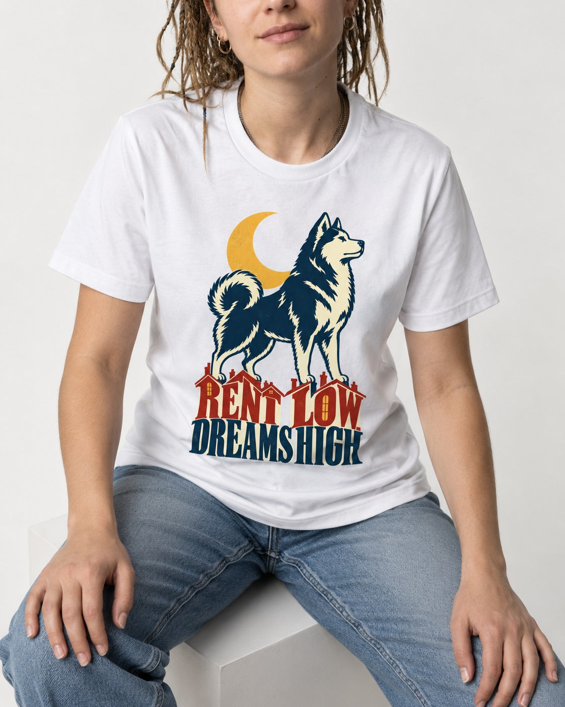 Husky Dreams High T-Shirt in White, worn by a seated model