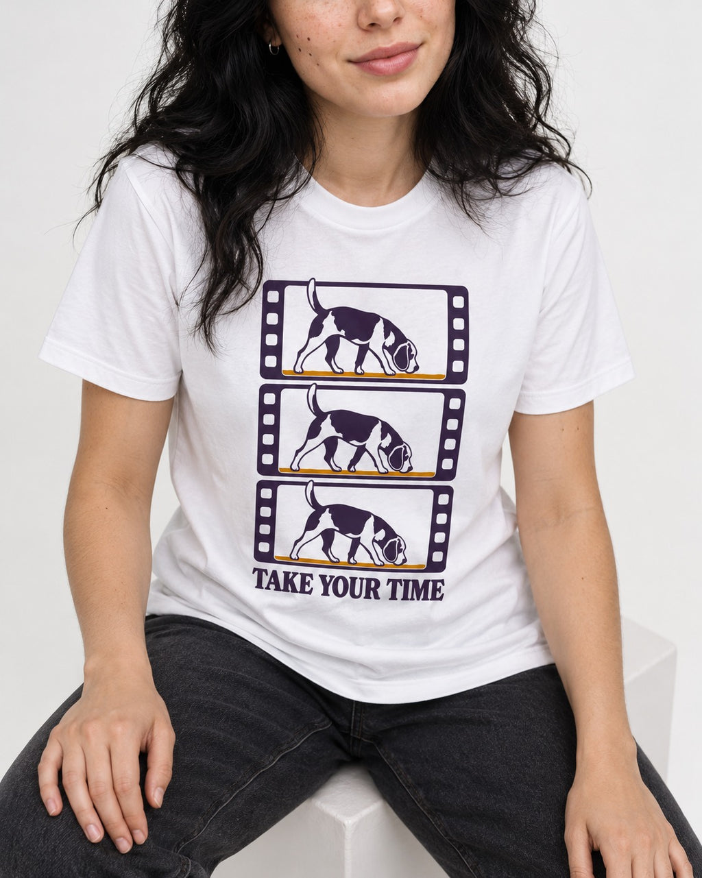 Beagle Take Your Time T-Shirt in White, worn by a seated model