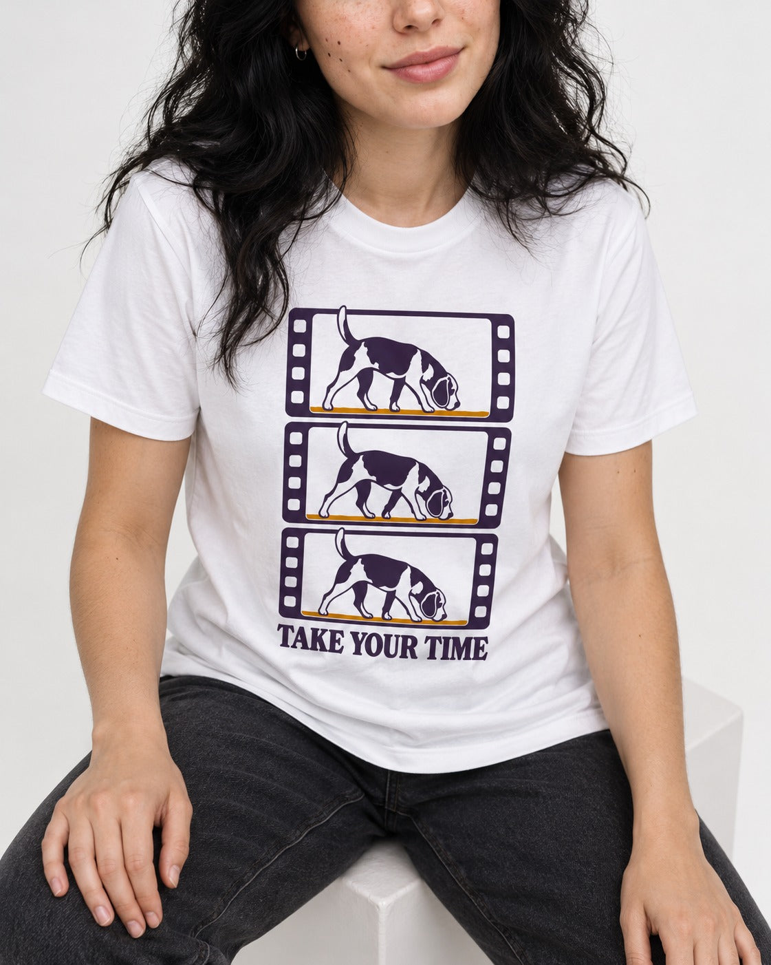 Beagle Take Your Time T-Shirt in White, worn by a seated model
