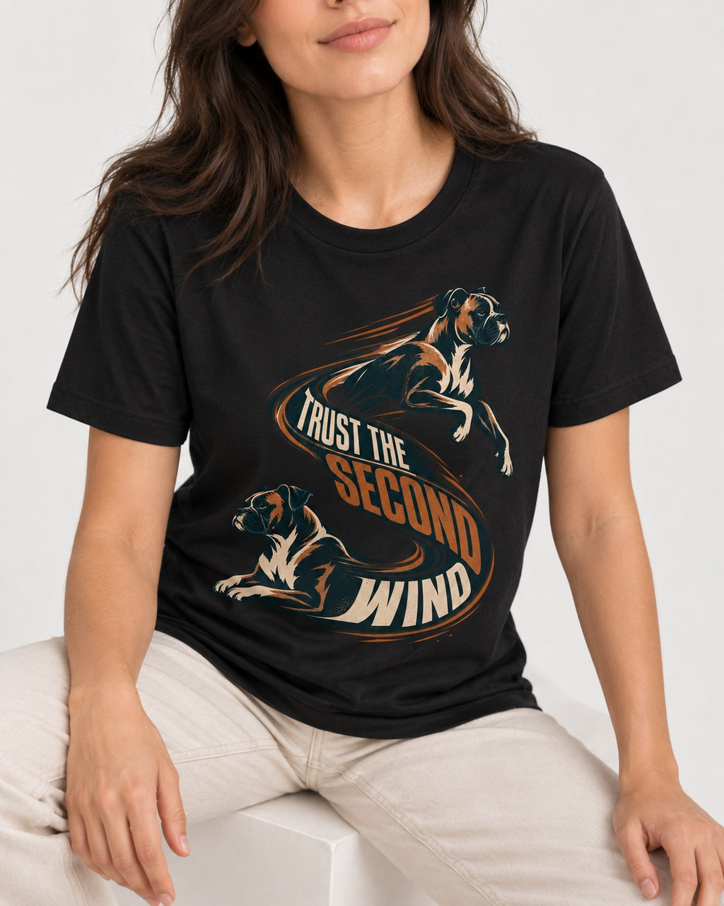 Trust the Second Wind Boxer Motion Graphic T-Shirt in Black, worn by a seated model