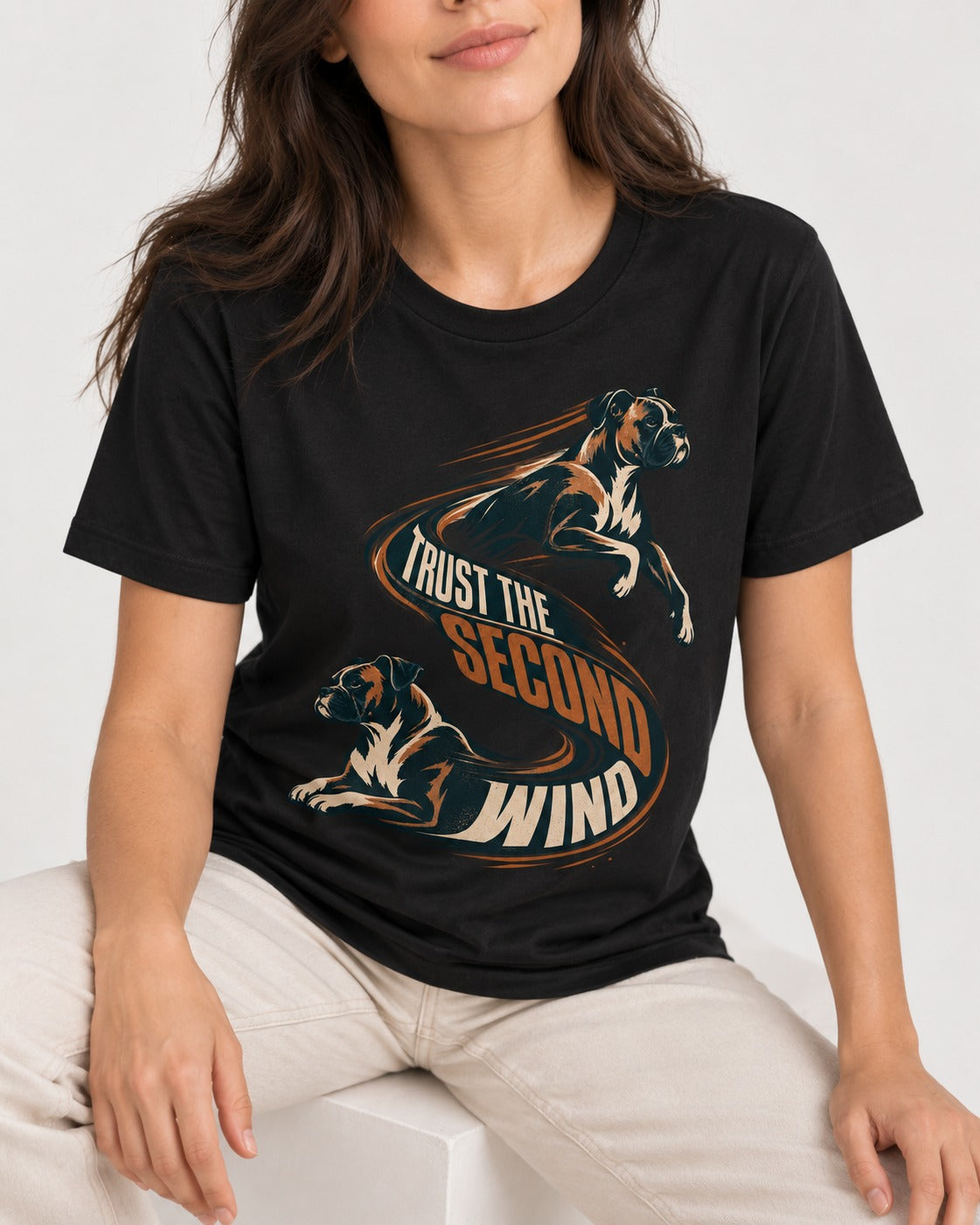 Trust the Second Wind Boxer Motion Graphic T-Shirt in Black, worn by a seated model