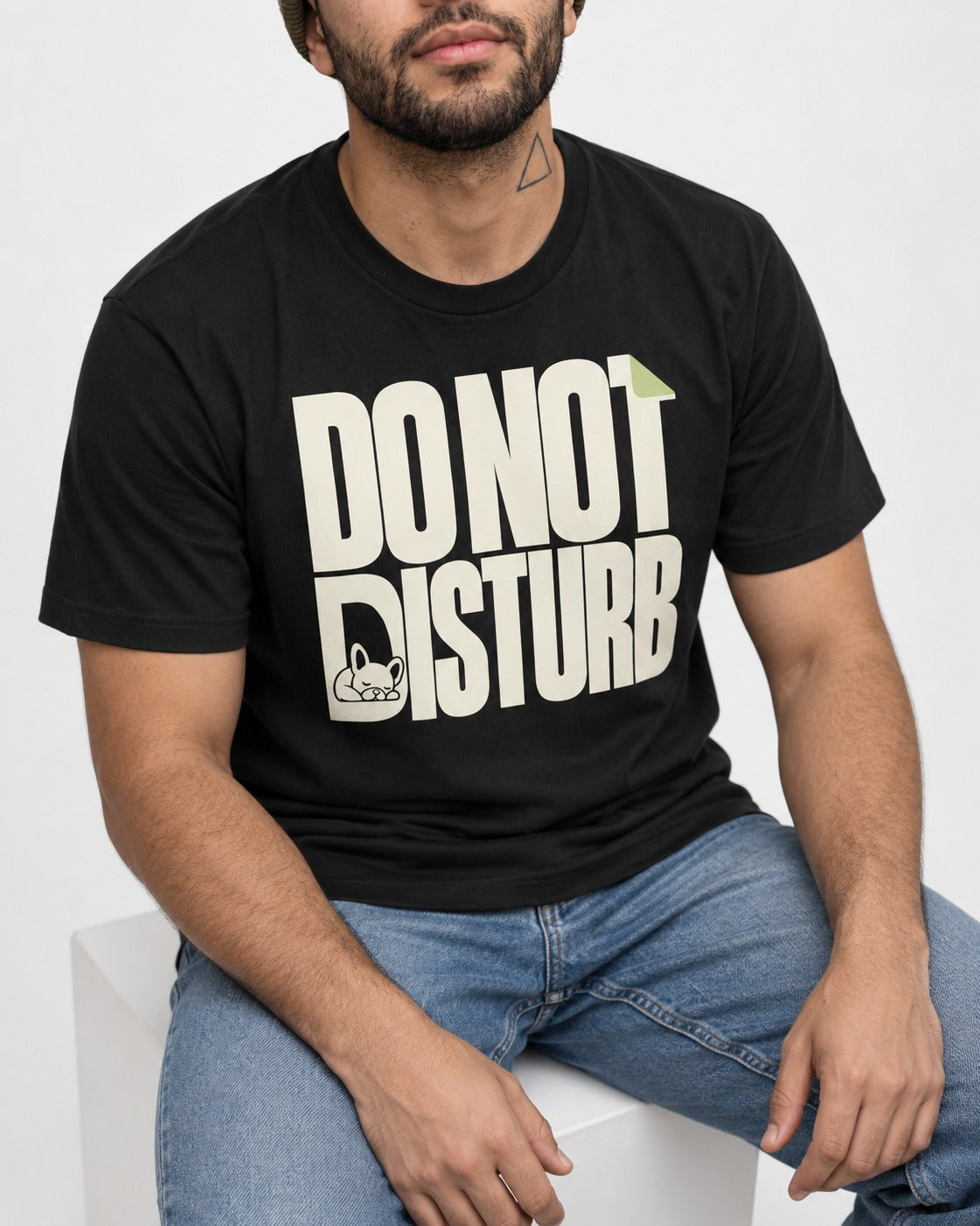 Frenchie Do Not Disturb Hidden Sleeping Graphic T-Shirt in Black, worn by a seated model