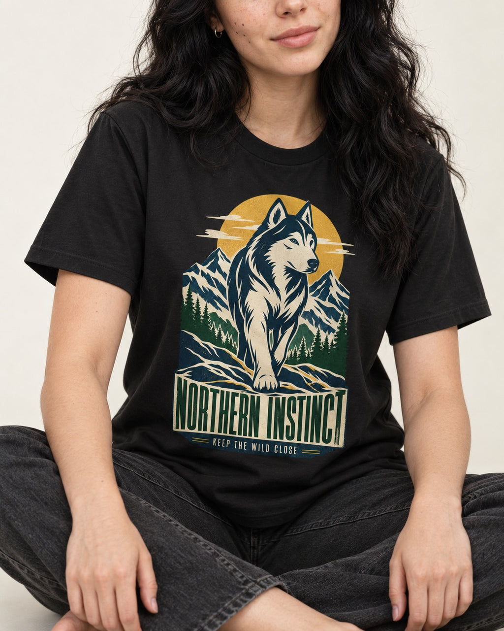 Husky Northern Instinct Mountain Sentinel T-Shirt in Black, worn by a seated model