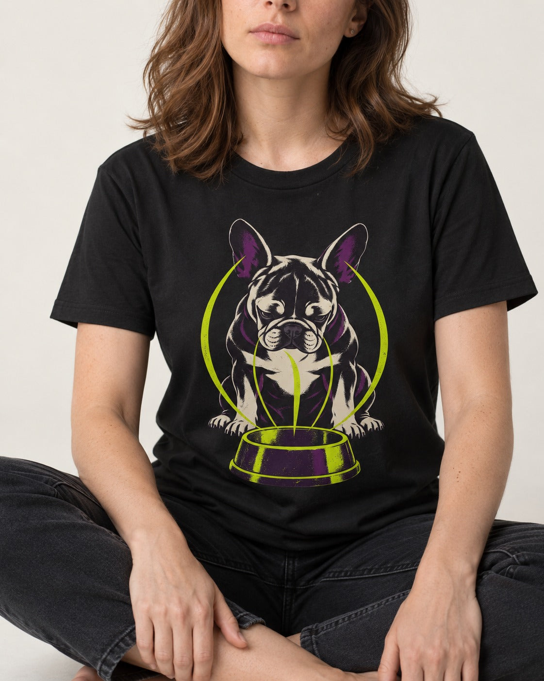 Frenchie Bowl Gravity Graphic T-Shirt in Black, worn by a seated model