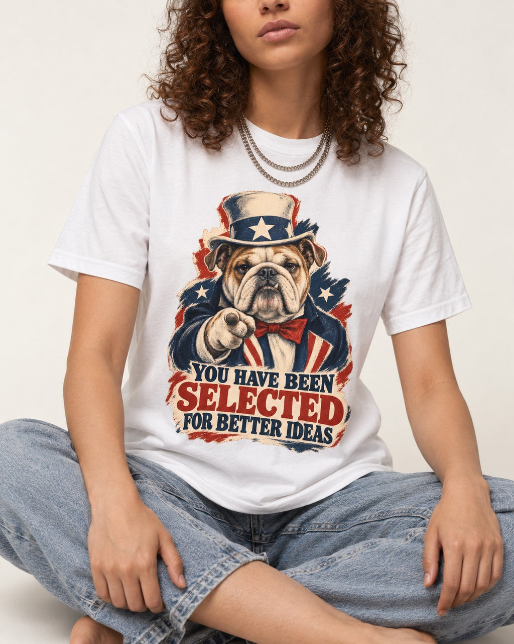 English Bulldog Selected for Better Ideas T-Shirt in White, worn by a seated model
