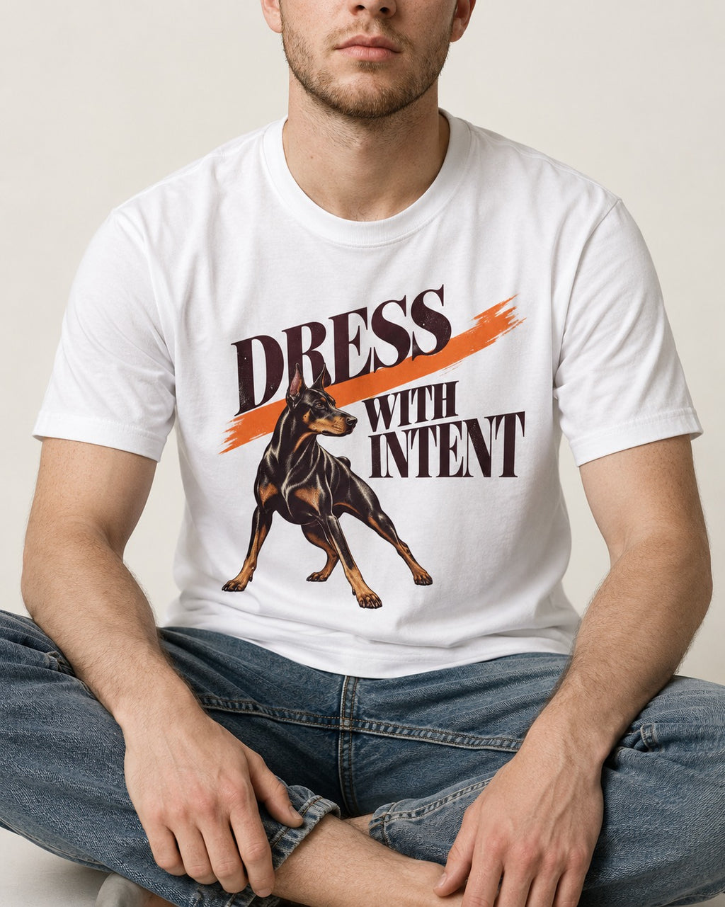 Doberman Dress with Intent T-Shirt in White, worn by a seated model