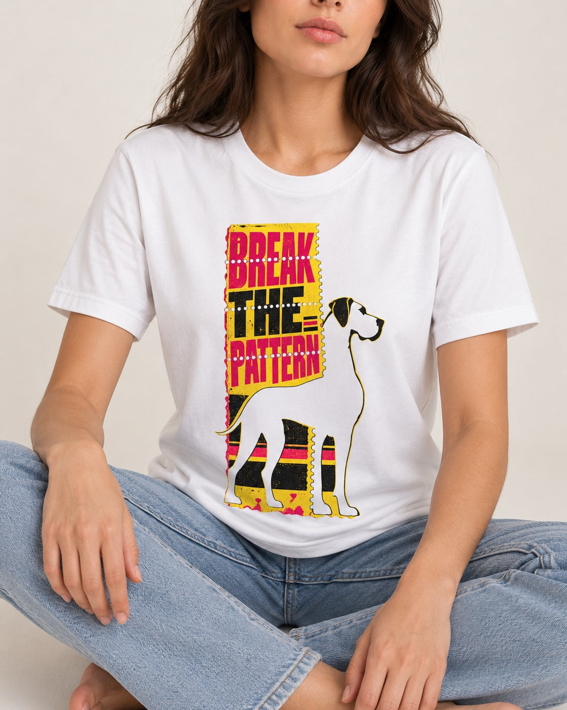 Great Dane Break the Pattern T-Shirt in White, worn by a seated model