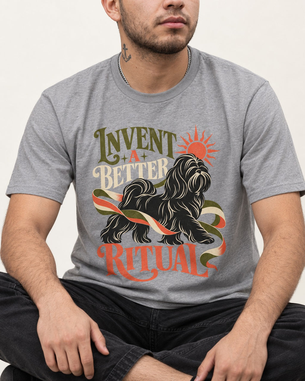 Shih Tzu Invent A Better Ritual Sunrise Ribbon Graphic T-Shirt in Sport Grey, worn by a seated model
