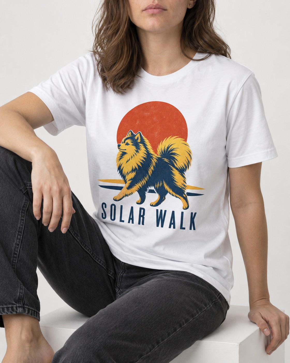 Pomeranian Solar Walk T-Shirt in White, worn by a seated model