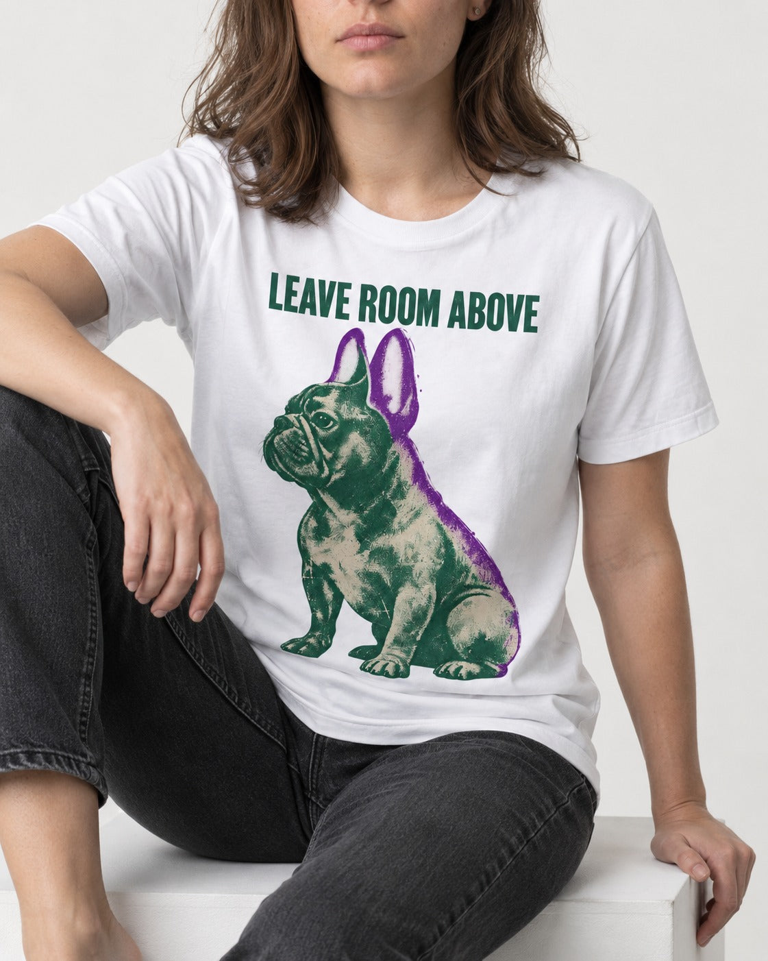 Leave Room Above Frenchie T-Shirt in White, worn by a seated model