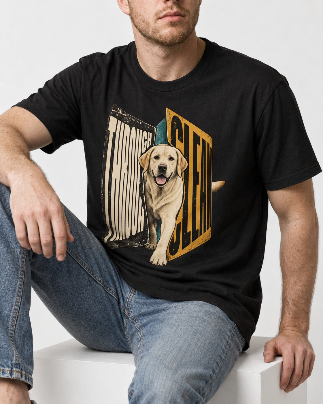 Labrador Retriever Through Steel Split Sign Graphic T-Shirt in Black, worn by a seated model