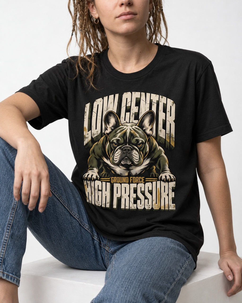 Frenchie Low Center High Pressure Graphic T-Shirt in Black, worn by a seated model