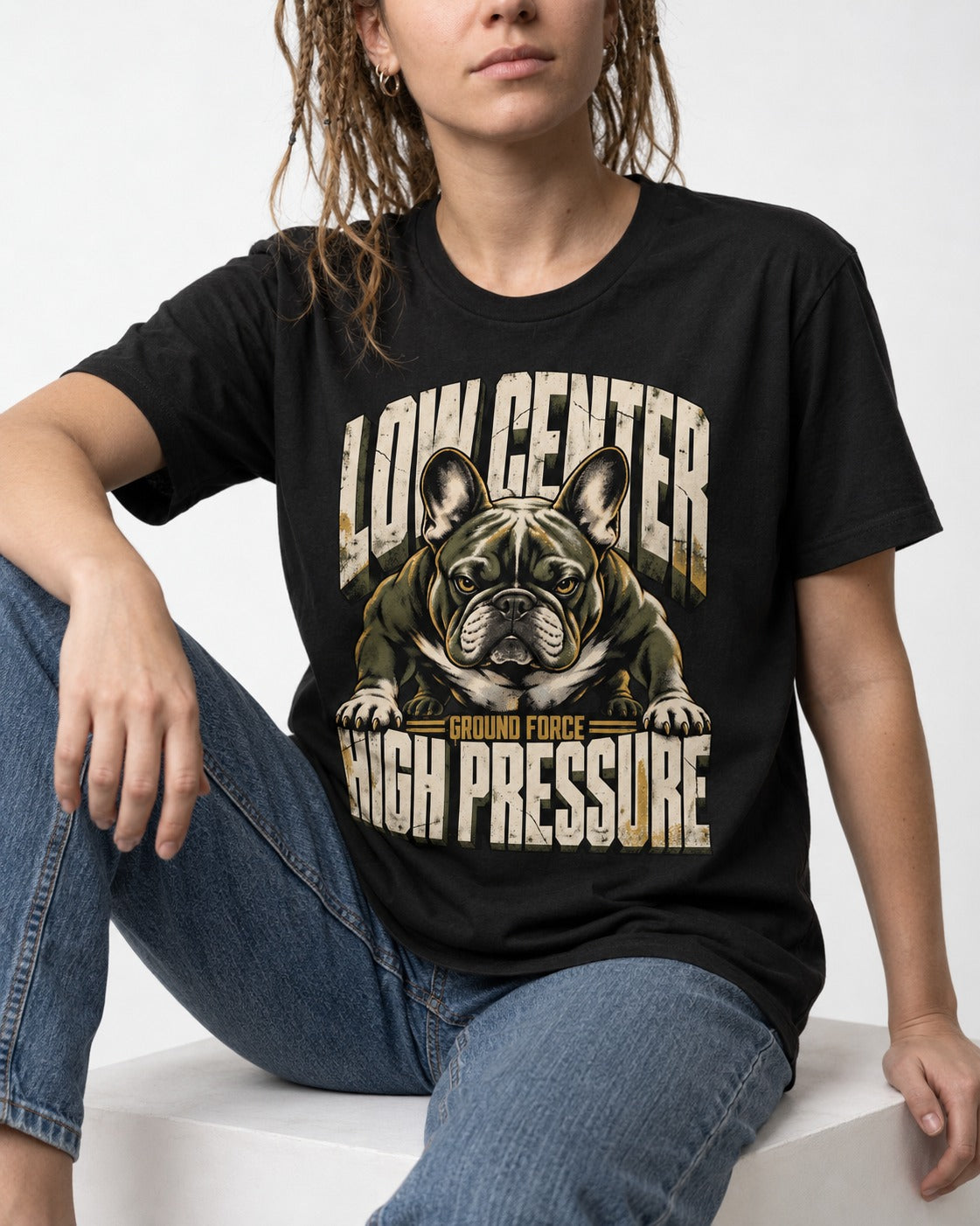 Frenchie Low Center High Pressure Graphic T-Shirt in Black, worn by a seated model