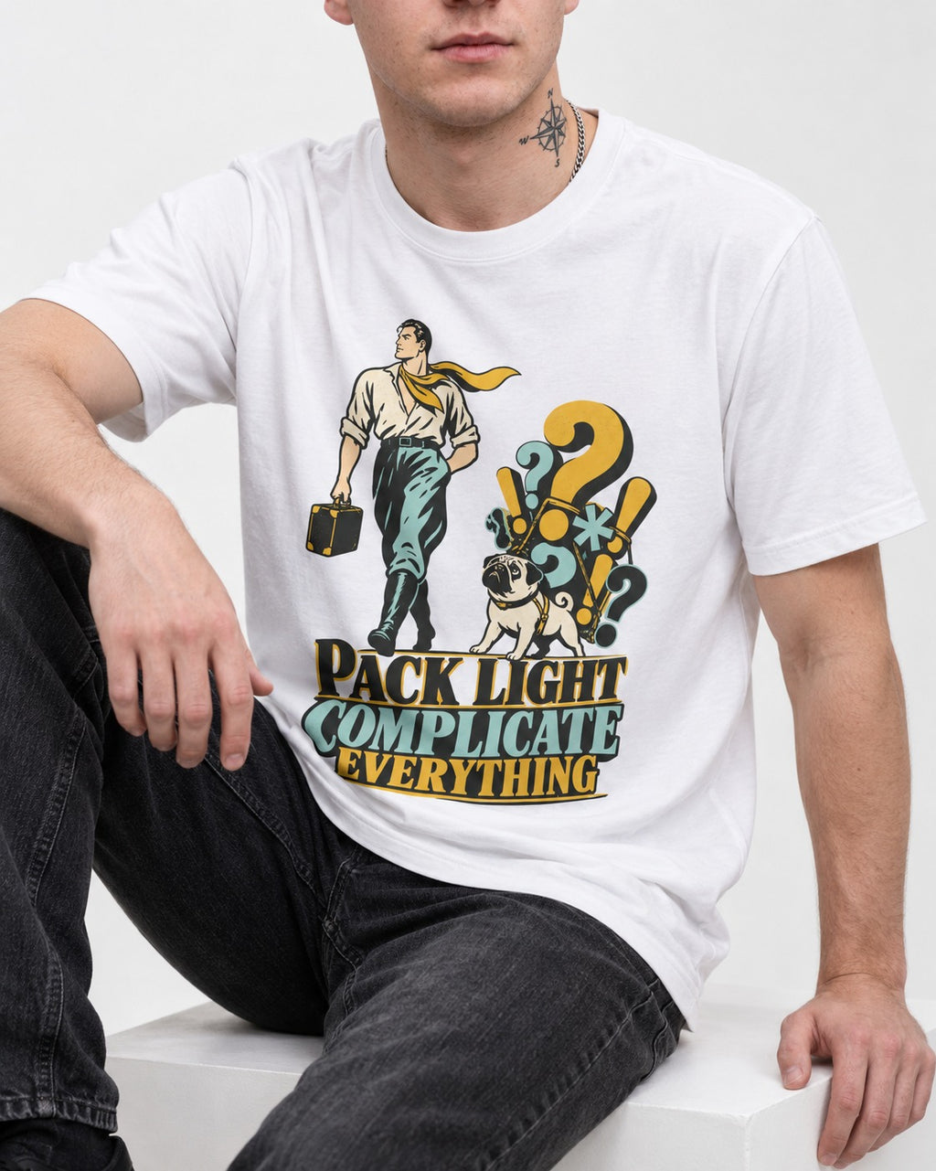 Pug Pack Light Complicate Everything T-Shirt in White, worn by a seated model