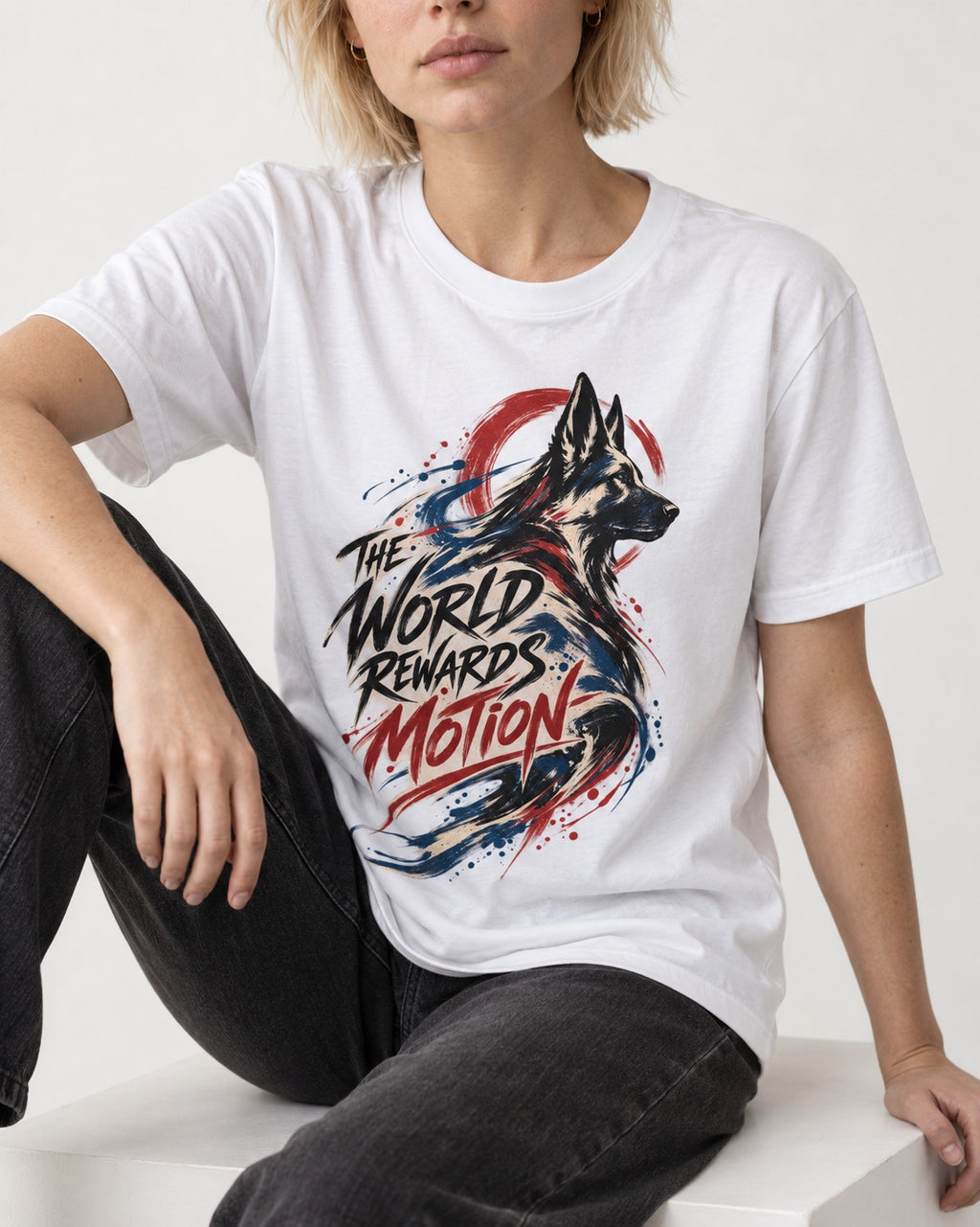German Shepherd Dog The World Rewards Motion T-Shirt in White, worn by a seated model