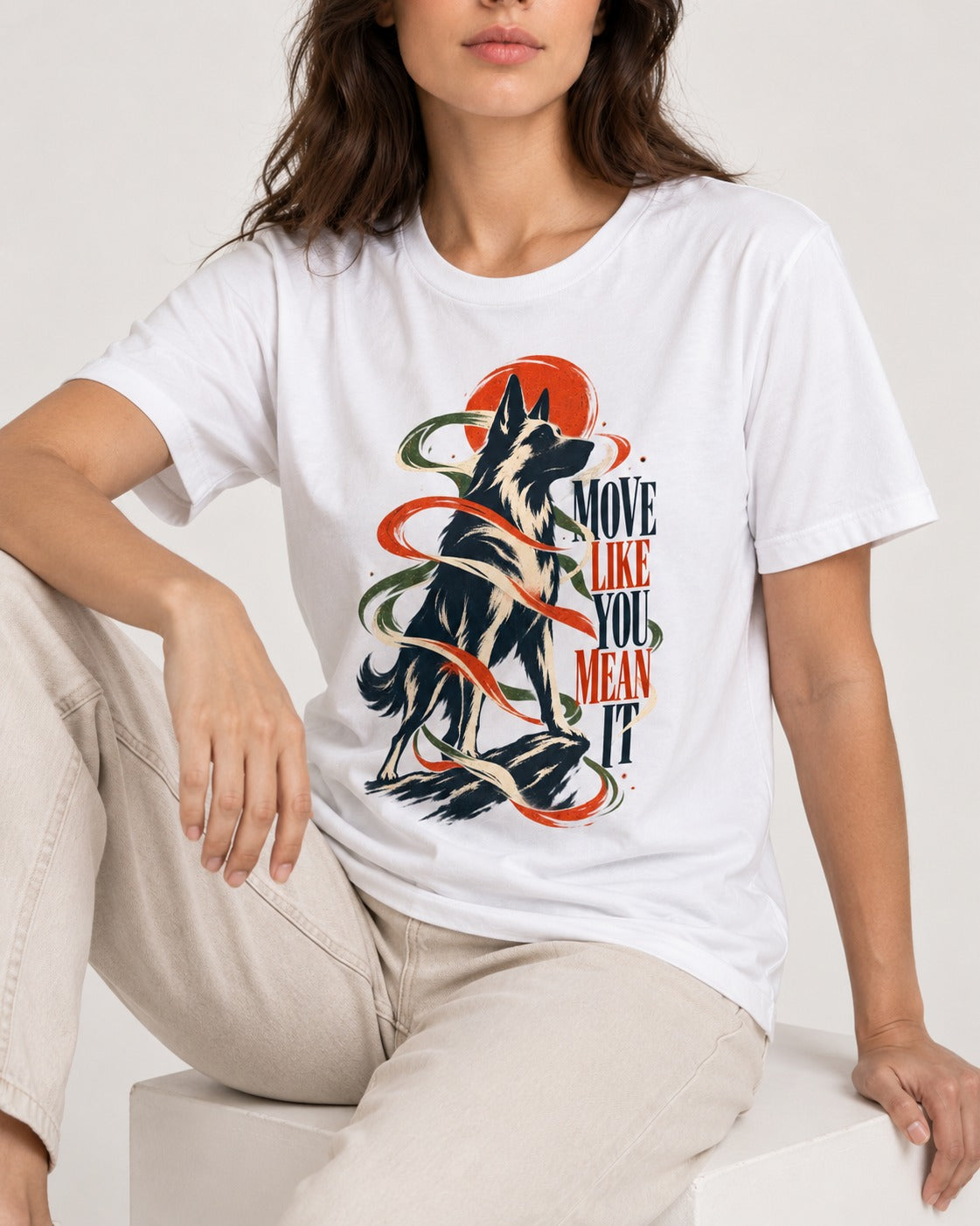 German Shepherd Dog Mean It T-Shirt in White, worn by a seated model
