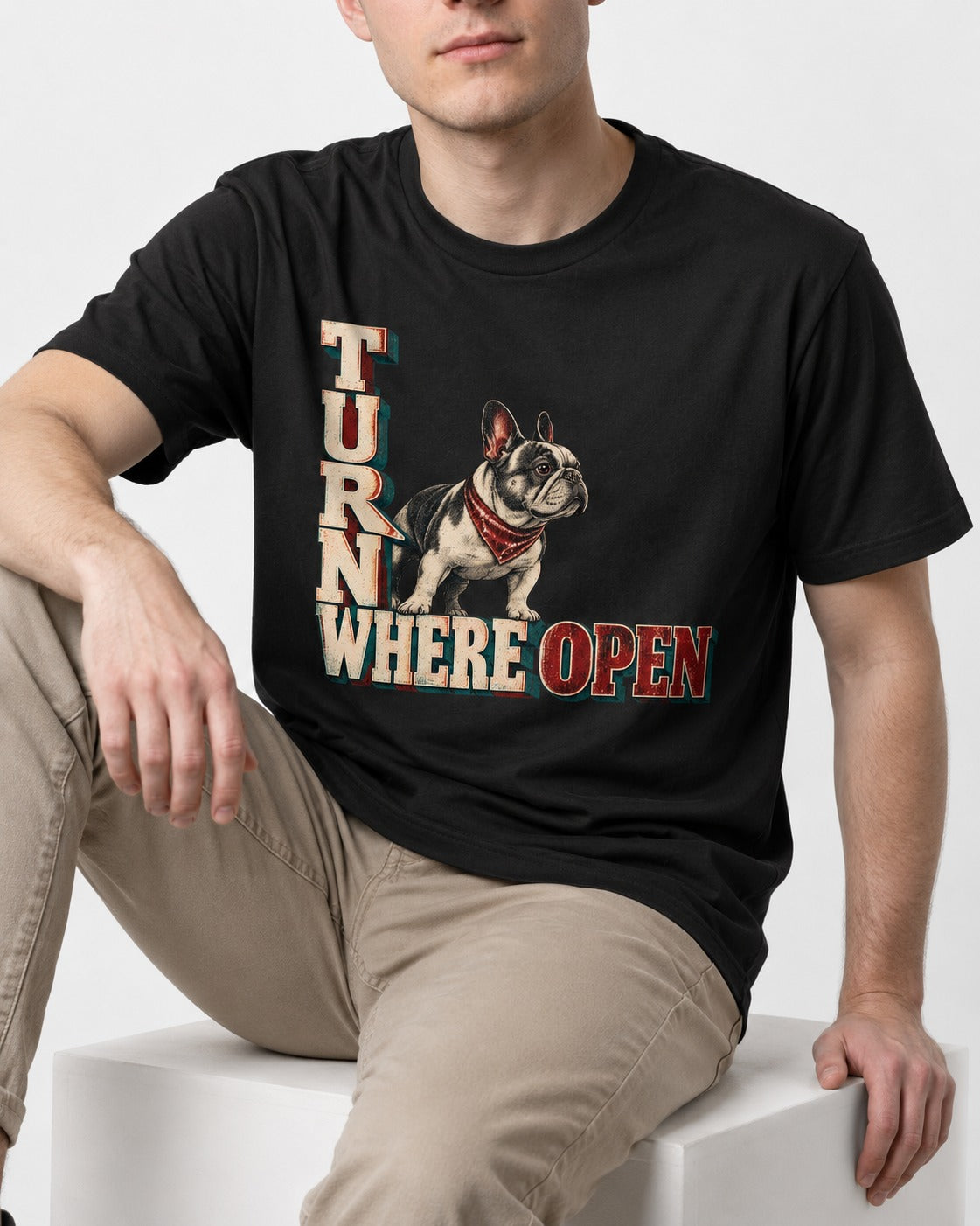 Turn Where Open Frenchie T-Shirt in Black, worn by a seated model