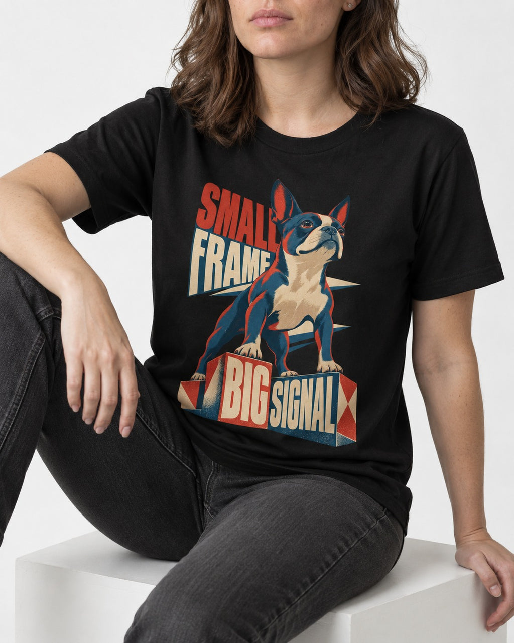 Small Frame Big Signal Boston Terrier T-Shirt in Black, worn by a seated model