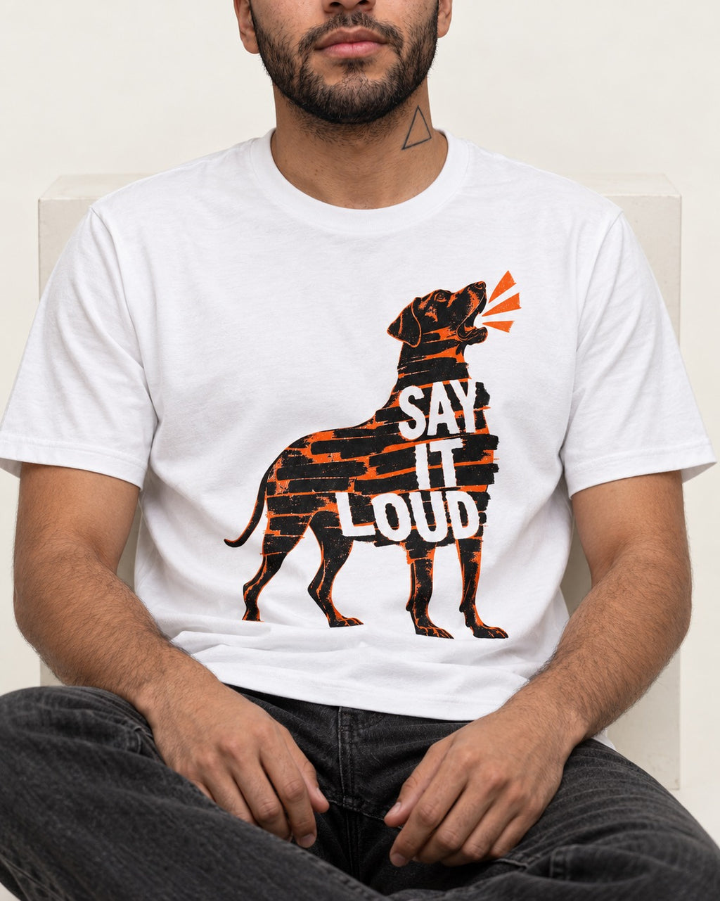 Great Dane Say It Loud T-Shirt in White, worn by a seated model