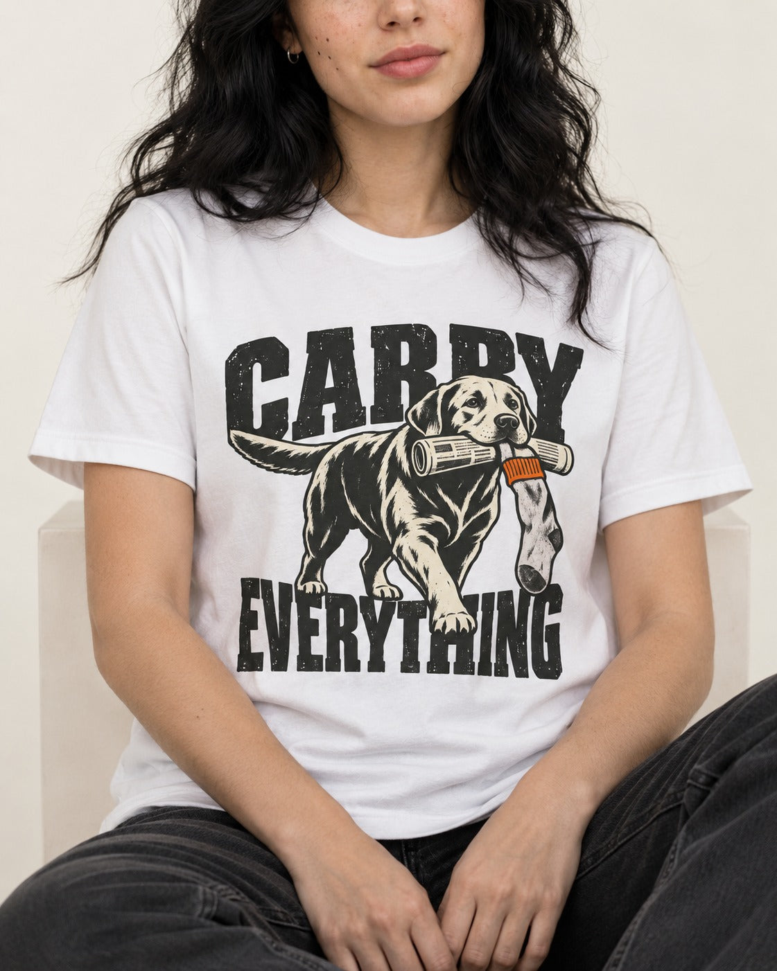 Carry Everything Labrador Retriever T-Shirt in White, worn by a seated model