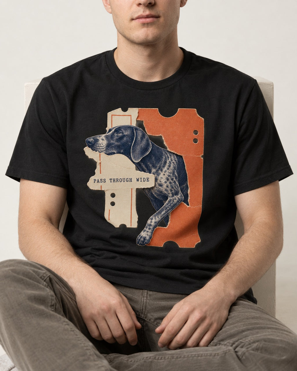 German Shorthaired Pointer Pass Through Wide Ticket Graphic T-Shirt in Black, worn by a seated model